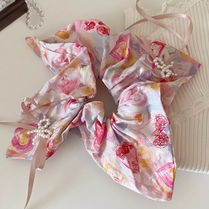 Floraler Haargummi mit rosa Bändern und Perlenkreuz-Anhängern für Damen