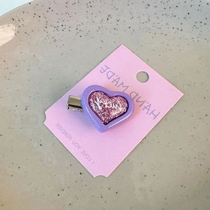 Sparkly purple heart-shaped Y2K hair clip with lucky glitter and pink card holder