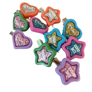 Colorful Y2K star and heart hair clips set with glitter finish and Lucky lettering