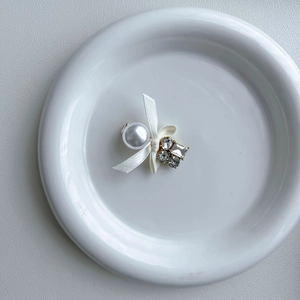 Elegant bow hair clip with faux pearl and sparkling zircon rhinestones on gold metal base