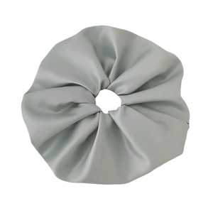 Premium silver grey satin scrunchie with elegant pleated design for high-end hairstyles