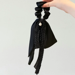 Elegant black lace bow scrunchie with satin ribbon and white pearl pendant detail