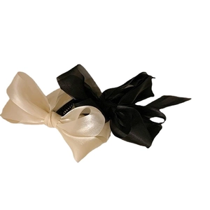Large chiffon bow banana hair clips set in cream and black for elegant ponytails