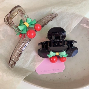 Sweet cherry shark hair clips in transparent brown and black with green bow accents