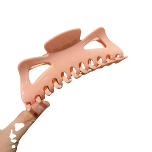 Extra large French peach pink matte shark hair clip for thick hair styling in casual daily use
