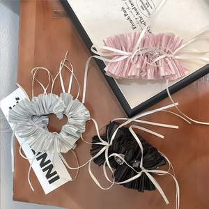 Chic ruffled bow hair scrunchies with heart crystal, available in pink, grey, and black colors