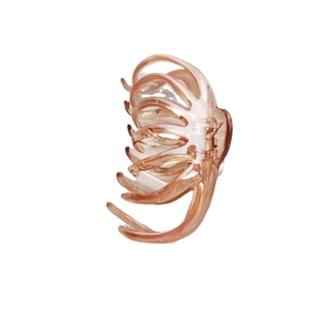 Elegant amber translucent octopus hair claw clip with strong gold metal spring