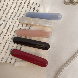 Set of five acetate hair clips in Morandi colors with elegant gold handmade lettering