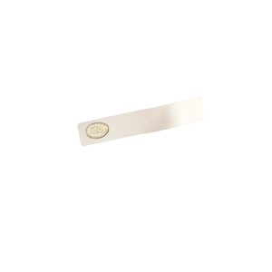 Minimalist cream resin hair clip with gold logo nameplate shown on white background