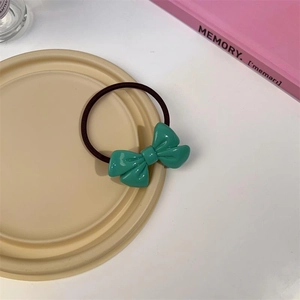 Élastique à cheveux mignon avec nœud en résine verte pour coiffures de filles