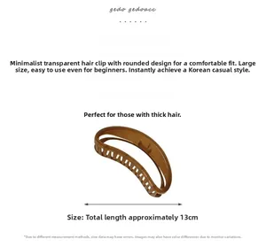 Macro view of 13cm brown crescent hair claw clip featuring polished resin finish