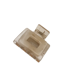 Minimalist large square hair claw clip with cream marble pattern and silver spring