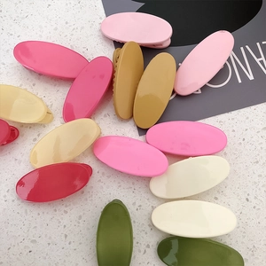 Colorful oval matte finish hair clips for girls in various pastel candy colors set