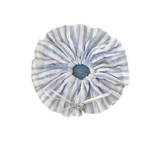 Elegant blue and white striped hair scrunchie with a white lace bow accessory for women