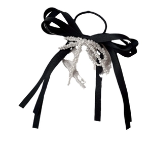 Elegant pearl bow hair tie for high ponytail featuring black satin and white pearls