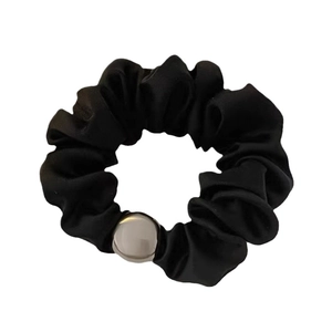 Elegant black satin scrunchie with a large polished silver bead for chic hair styling