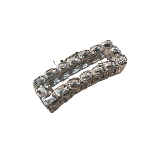 Sparkling silver square hair claw clip with emerald cut crystals in a minimalist style