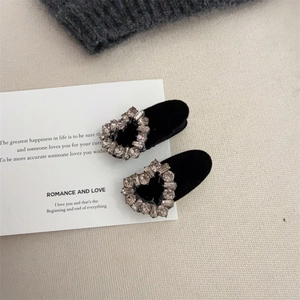 Velvet hair clip set with sparkling rhinestone heart on a minimalist beige background