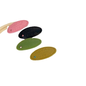 Set of four colorful French style soap-shaped hair clips with embossed Savon text and rhinestones