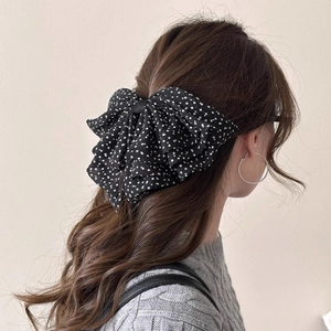 Elegant large black organza bow hair clip with white polka dots for women's ponytail