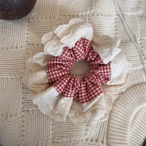 French style red checkered scrunchie with white lace trim and pearls on beige knit