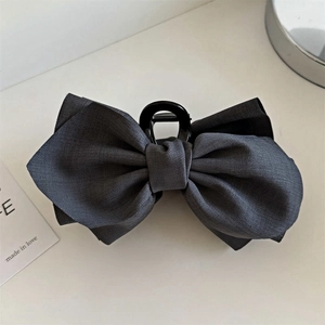Elegant large charcoal grey fabric bow hair claw clip with twill texture for women