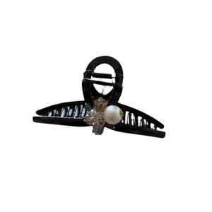 Elegant black hair claw clip featuring white pearl and amber crystal beads accents