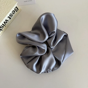 Elegant large grey satin scrunchie for hair ponytail with glossy silk-like texture