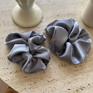 Two-piece set of large satin scrunchies in elegant grey and silver silk-like fabric