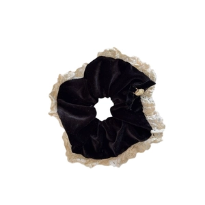 Elegant black velvet scrunchie with beige lace trim and gold charm for French style hair
