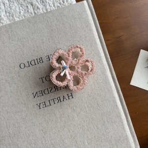 Pink floral hair claw clip with pearls and ribbon bow for elegant styling