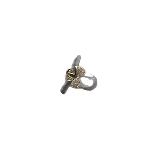 Mini bow hair claw clip with gold rhinestones on translucent grey resin base