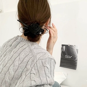 Elegant black satin rose hair tie scrunchie featuring a center bead for women
