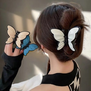 Elegant French butterfly hair claw clip for women featuring a glossy acrylic design