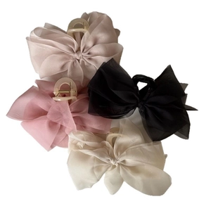Elegant four-pack chiffon ribbon bow hair claws in pink, black, beige, and taupe