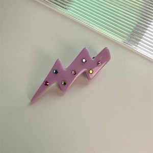 Violetter Haarclip in Blitzform mit bunten Sternen aus Acetat für Mädchen