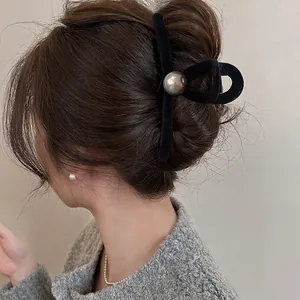 Elegant black velvet claw clip with a silver pearl ball, large hair accessory for women