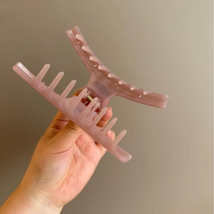 Sparkling pink rhinestone hair claw clip for ponytail styling in minimalist Korean style