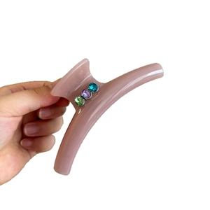 Pink acrylic ponytail hair claw clip with colorful sparkling rhinestones for women