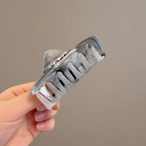 Elegant medium marble pattern hair claw clip for bun styles with durable acetate finish