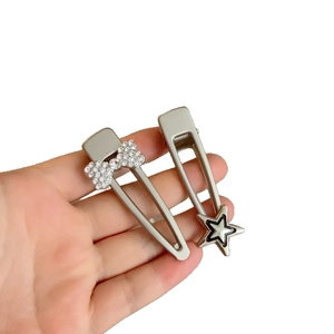 Barrettes à cheveux Y2K avec étoile et nœud en strass en finition argentée