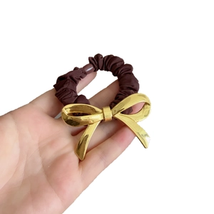 Chic elastico per capelli marrone scuro con fiocco in metallo dorato per capelli