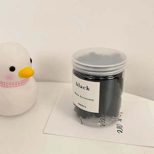 Lot de 50 élastiques à cheveux noirs haute élasticité rangés dans un pot cylindrique