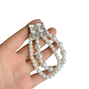 Élastique à cheveux double rangée de perles avec fermoir en zircone cubique carrée