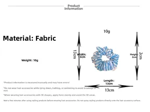 Blue striped fabric scrunchie detail showing dimensions 13x13cm and soft texture