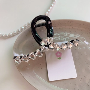Pince à cheveux élégante noire ornée de strass en forme de cœur pour coiffure chic