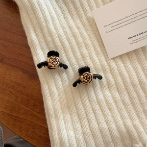 Elegant pair of black hair clips with gold relief roses for French style hairstyles