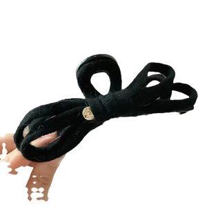 Elegant black velvet knit bow hair claw clip with vintage gold metal button accent