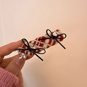 Elegant red and white plaid tweed hair clip with black bows and crystal heart accents