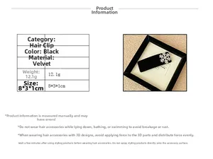 Detail view of black velvet hair clip with rhinestone snowflake, dimensions 8x3x1cm